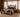 Pair of rustic electric lantern table lamps on nightstands beside a rustic log bed